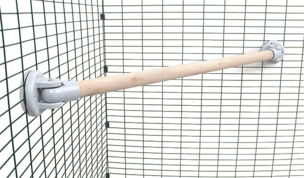 a wooden perch in a walk in run