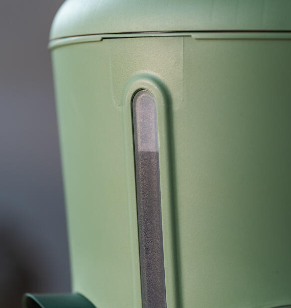 close up of visible water level window on omlet insulated chicken waterer
